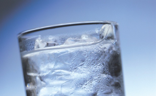 close-up of a glass of water and ice